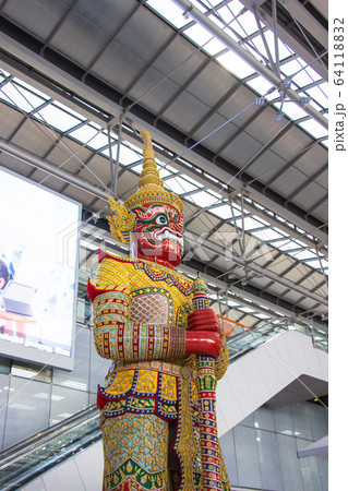 Red color giant Sculptures inside Suvarnabhumi International Airport Samutprakan. Thailand. Red color giant Sculptures inside Suvarnabhumi International Airport Samutprakan. Thailand. 64118832
