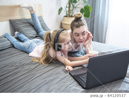 Schoolgirls  studing at home 64120537