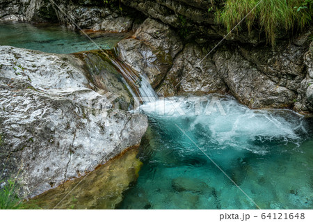 waterfall with clear green water waterfall with clear green water 64121648