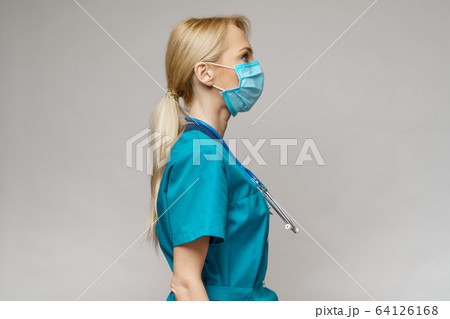medical doctor nurse woman with stethoscope wearing protective mask and rubber or latex gloves medical doctor nurse woman with stethoscope wearing protective mask and rubber or latex gloves 64126168