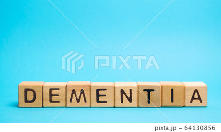 Wooden blocks with the word Dementia. Decrease in cognitive activity and memory. Emotional problems, decrease in motivation, difficulties with language. Brain diseases Wooden blocks with the word Dementia. Decrease in cognitive activity and memory. Emotional problems, decrease in motivation, difficulties with language. Brain diseases 64130856