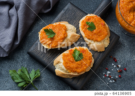 Sandwiches with bread zucchini caviar tomatoes Sandwiches with bread zucchini caviar tomatoes 64136905