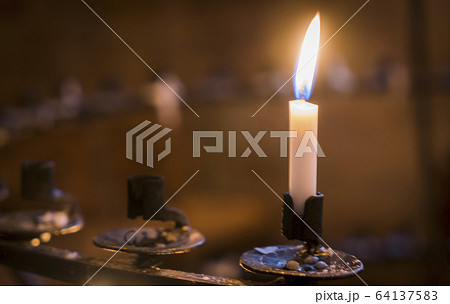 candle in a church 64137583