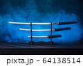 Three swords on a stand with exposed blades 64138514