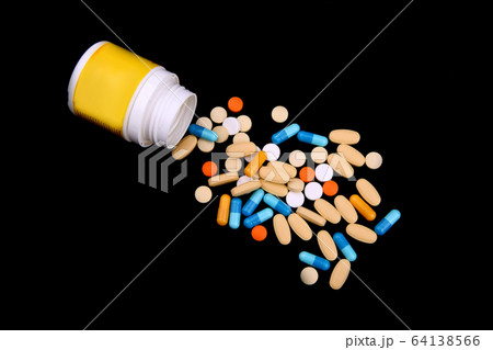 Pills, capsules, drugs isolated on black background. Pills, capsules, drugs isolated on black background. 64138566