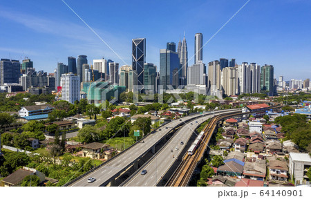 Kuala lumpur city skyline with blue sky Kuala lumpur city skyline with blue sky 64140901