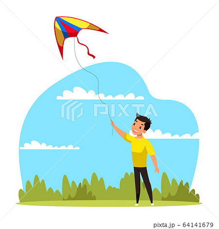 Little boy flying kite having fun in green park 64141679