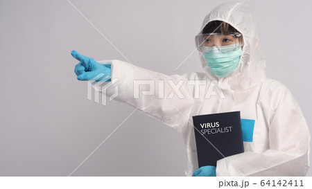 Asian woman doctor in PPE suit with hood and wearing medical mask and gloves for best protection Asian woman doctor in PPE suit with hood and wearing medical mask and gloves for best protection 64142411