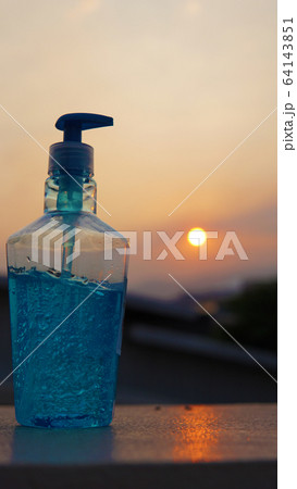 Alcohol based hand sanitizers gel to protect germs and bacteria during the Covid-19 or Coronavirus pandemic. 64143851