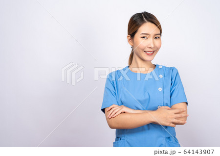 Portrait of young asian nurse on white background 64143907