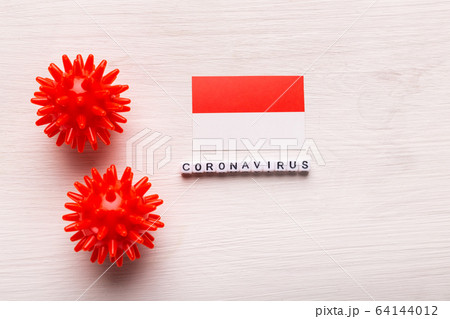 Abstract virus strain model of 2019-nCoV middle East respiratory syndrome coronavirus or coronavirus COVID-19 with text and flag Indonesia on white background. Virus pandemic protection concept. 64144012