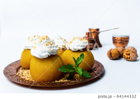 Traditional Bosnian apple cake filled with walnuts Traditional Bosnian apple cake filled with walnuts 64144332
