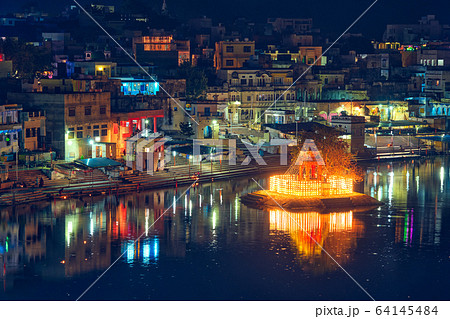 View of indian pilgrimage sacred city Pushkar with Pushkar ghats. Rajasthan, India. Horizontal pan View of indian pilgrimage sacred city Pushkar with Pushkar ghats. Rajasthan, India. Horizontal pan 64145484