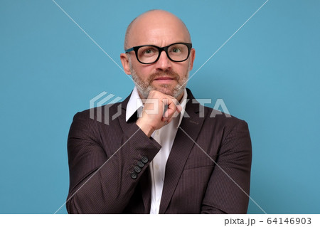 handsome caucasian mature man in suit portrait 64146903