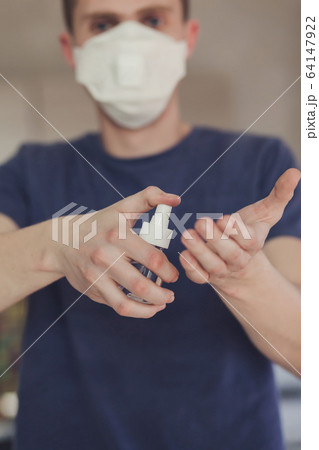 Man with an antibacterial antiseptic 64147922