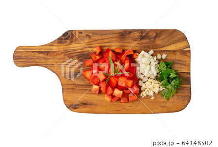 Chopped paprika or red sweet pepper cuts on wooden 64148502