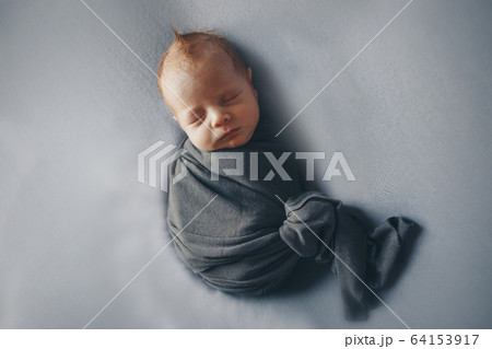 the concept of healthy lifestyle, IVF - a newborn baby sleeps under a blanket. Copy space the concept of healthy lifestyle, IVF - a newborn baby sleeps under a blanket. Copy space 64153917