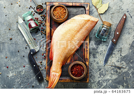 Uncooked red perch Uncooked red perch 64163675