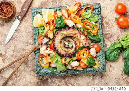 Sea salad with vegetables 64164850