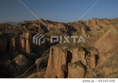 Binggou Danxia Landform National Park, beautiful rock formation in Zhangye, Gansu during sunset golden hour Binggou Danxia Landform National Park, beautiful rock formation in Zhangye, Gansu during sunset golden hour 64165306