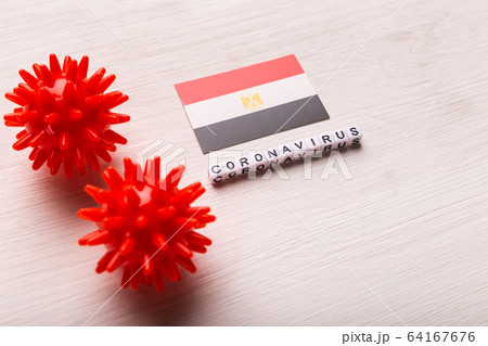 Abstract virus strain model of 2019-nCoV middle East respiratory syndrome coronavirus or coronavirus COVID-19 with text and flag Egypt on white background. Virus pandemic protection concept. 64167676