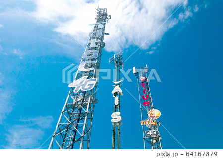 Mobile phone masts in the country, Thailand. 64167879