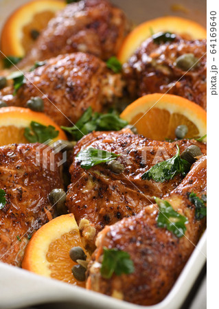 Fried chicken with oranges 64169640