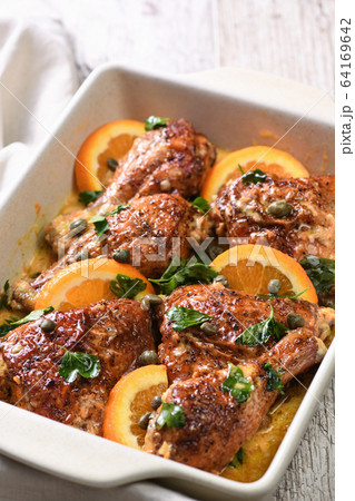Fried chicken with oranges 64169642