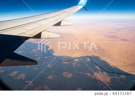 Sahara Desert and the Nile River seen from the plane - Egypt Africa 64171167