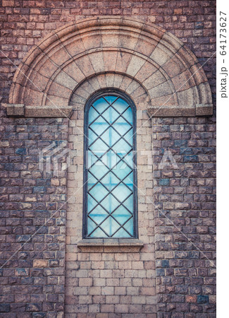 Vaulted arched window of roman catholic church 64173627