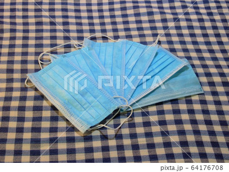 blue face masks used against corona covid-19 blue face masks used against corona covid-19 64176708