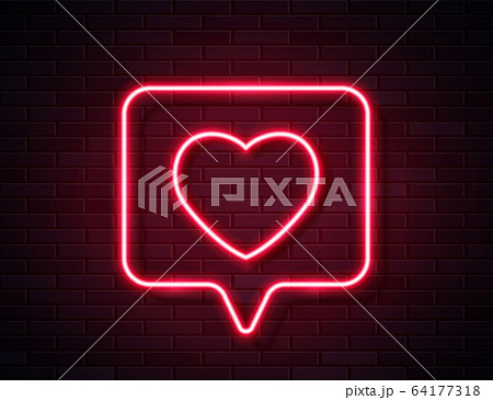 Neon Red Glowing Heart in Spech Bubble Banner on Dark Empty Grunge Brick Background. 64177318