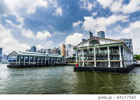 Hong Kong Maritime Museum with the Ferris wheel and skyscrapers in the background, Central Hong Kong. Hong Kong Maritime Museum with the Ferris wheel and skyscrapers in the background, Central Hong Kong. 64177565