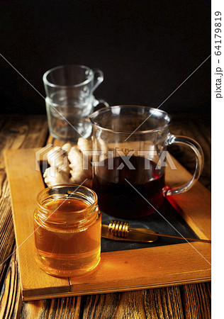 honey with ginger honey with ginger 64179819