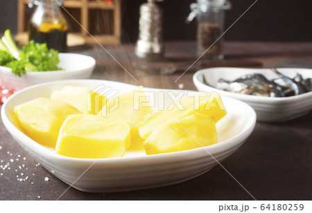 potato with fish potato with fish 64180259