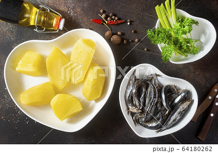 potato with fish potato with fish 64180262