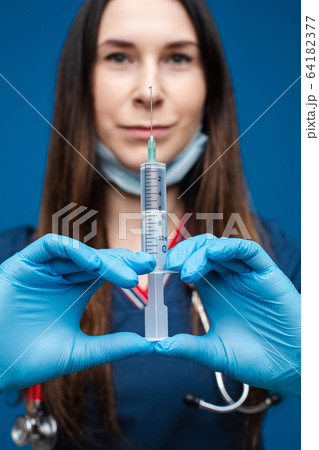 Beautiful woman doctor in white medical clothes 64182377