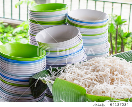White rice noodle on banana leaf with bowl for White rice noodle on banana leaf with bowl for 64187084