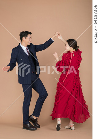 Portrait of female and male in retro fashion and vintage concept 404 64187366