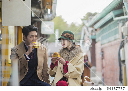 Portrait of female and male in retro fashion and vintage concept 138 64187777