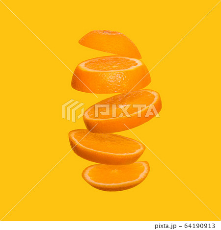 Creative concept with flying orange. Sliced orange Creative concept with flying orange. Sliced orange 64190913