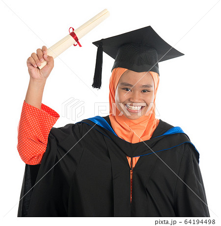 Female student in graduation gown 64194498