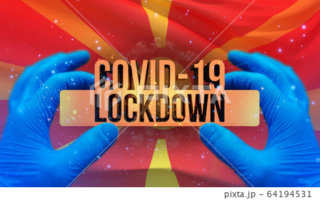 COVID-19 lockdown concept with backgroung of waving national flag of North Macedonia. Pandemic 3D illustration. 64194531