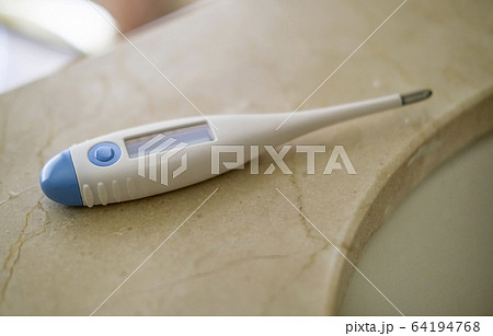 Thermometer on stone surface 64194768