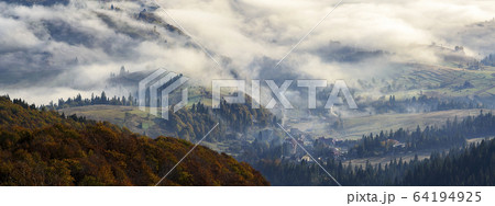 Ukraine, Zakarpattia region, Carpathians, Borzhava, Foggy hills of Carpathian Mountains at sunrise Ukraine, Zakarpattia region, Carpathians, Borzhava, Foggy hills of Carpathian Mountains at sunrise 64194925