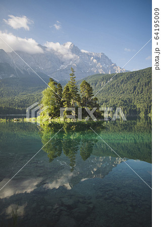 Germany, Bavaria, Eibsee, Scenic view of Eibsee lake in Bavarian Alps Germany at sunrise 64195009