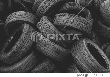 Discarded auto tires at landfill 64195480