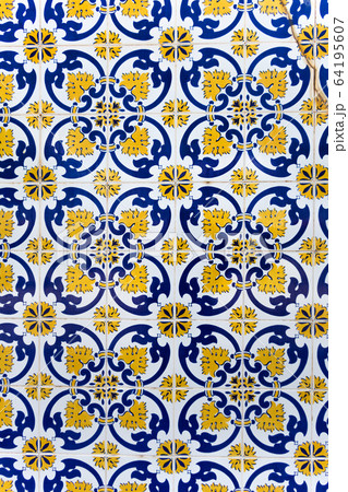 Vintage yellow and blue tiles, Algarve, Portugal 64195607