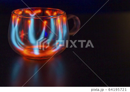 Red blue neon lightnings inside cup of bokeh Red blue neon lightnings inside cup of bokeh 64195721