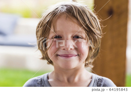 5 year old boy smiling at camera 64195843